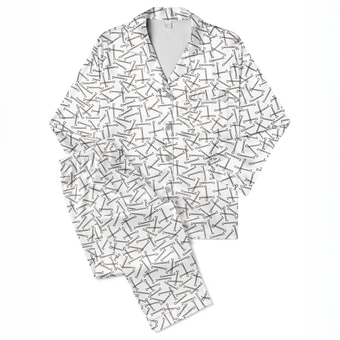 Patrón de líneas y formas abstractas en blanco y negro que asemejan horquillas o clips dispersos aleatoriamente sobre fondo claro. sutex pajamas fullview mockup