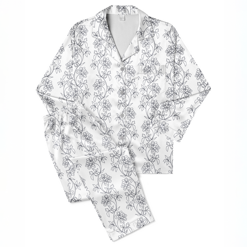 Patrón estampado floral con flores y hojas sobre fondo blanco, diseño botánico delicado sutex pajamas fullview mockup