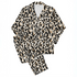 Estampado abstracto negro y dorado con formas orgánicas irregulares sobre fondo crema sutex pajamas fullview mockup