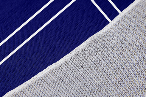 Texto blanco "Nuestro hogar" con flechas decorativas sobre fondo azul marino con marco doble sutex rug 2x3 closeup texture angled