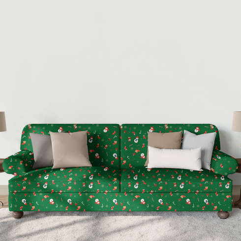Patrón navideño sobre fondo verde con muñecos de nieve, calcetines, bastones de caramelo y copos de nieve sutex sofa mockup