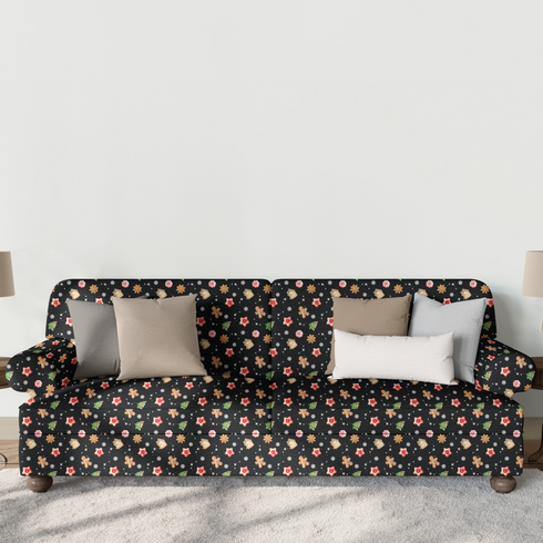Patrón navideño con galletas decoradas en forma de estrellas, copos de nieve, árbol, casa y muñeco de jengibre sobre fondo negro. sutex sofa mockup