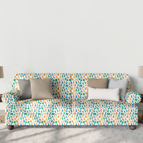 Patrón colorido de letras del alfabeto con diseños estilo dinosaurio en tonos azul, verde, amarillo y naranja sobre fondo blanco. sutex sofa mockup