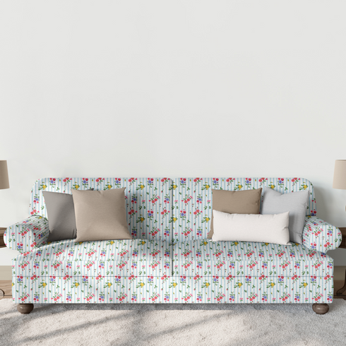Patrón floral con rosado, amarillo y azul sobre rayas verticales azules y blancas sutex sofa mockup