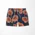 Flores estilizadas en tonos ocre y marrón sobre fondo negro oscuro, diseño artístico botánico decorativo sutex swimtrunks
