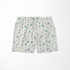 Patrón de flores azules pequeñas sobre fondo de rayas beige y blanco, estilo delicado y fresco sutex swimtrunks
