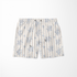 Patrón de rayas verticales con motivos florales delicados en tonos azules sobre fondo crema sutex swimtrunks