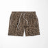 Estampado animal print de leopardo en café y beige sobre fondo negro sutex swimtrunks