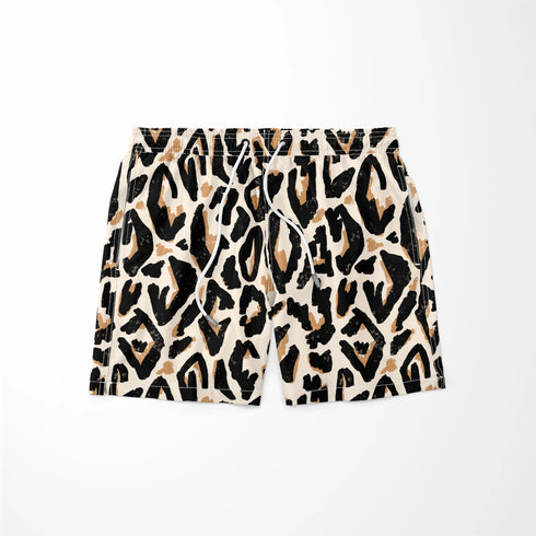 Estampado abstracto negro y dorado con formas orgánicas irregulares sobre fondo crema sutex swimtrunks