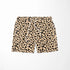 Patrón de pepas irregulares negras sobre fondo beige estilo animal print sutex swimtrunks