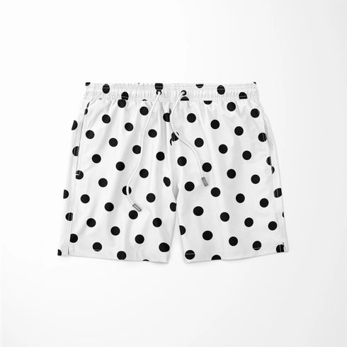 Patrón de pepas negras sobre fondo blanco, distribución uniforme y aleatoria