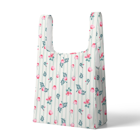 Patrón floral con rosas rosadas sobre fondo de rayas verticales grises y blancas sutex tote mockup