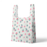 Patrón floral con rosas rosadas sobre fondo de rayas verticales grises y blancas sutex tote mockup