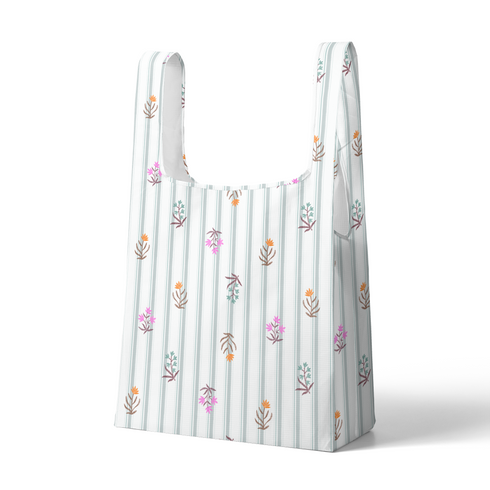 Patrón de rayas verticales gris con pequeños motivos florales en rosado, naranja y verde agua dispersos sutex tote mockup