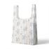 Patrón de rayas verticales con motivos florales delicados en tonos azules sobre fondo crema sutex tote mockup