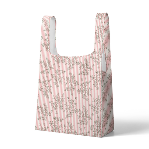 Patrón rosado con rayas verticales y estampado florales de ramas delicadas en gris sutex tote mockup