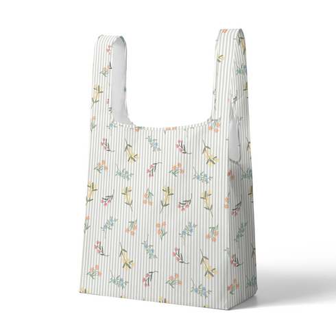 Patrón delicado de flores pequeñas en tonos rosado, amarillo y azul sobre fondo gris con rayas blancas sutex tote mockup