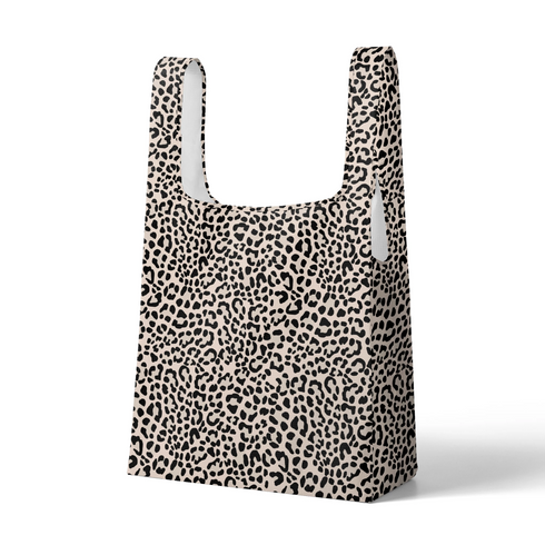 Estampado de pepas negras estilo leopardo sobre fondo beige sutex tote mockup