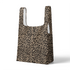 Estampado animal print de leopardo en café y beige sobre fondo negro sutex tote mockup