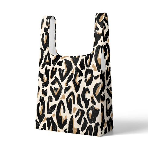 Estampado abstracto negro y dorado con formas orgánicas irregulares sobre fondo crema sutex tote mockup