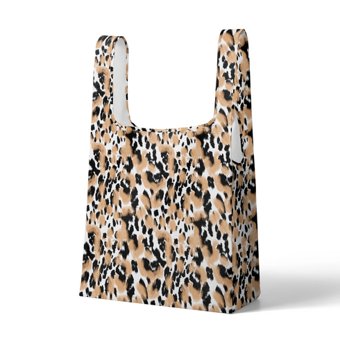 Estampado animal print en negro, café y blanco con manchas difuminadas estilo leopardo sutex tote mockup