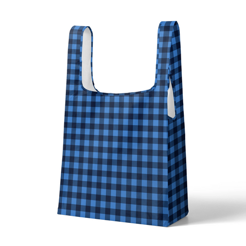 Patrón de cuadros en tonos azules y negro con efecto pixelado geométrico