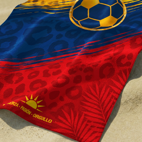Diseño deportivo Colombia con jaguar estampado, balón de fútbol, colores amarillo azul rojo, patrones geométricos sutex towel closeup