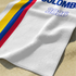 Bandera de Colombia 2026 con franjas amarillo, azul y rojo sobre fondo blanco sutex towel closeup