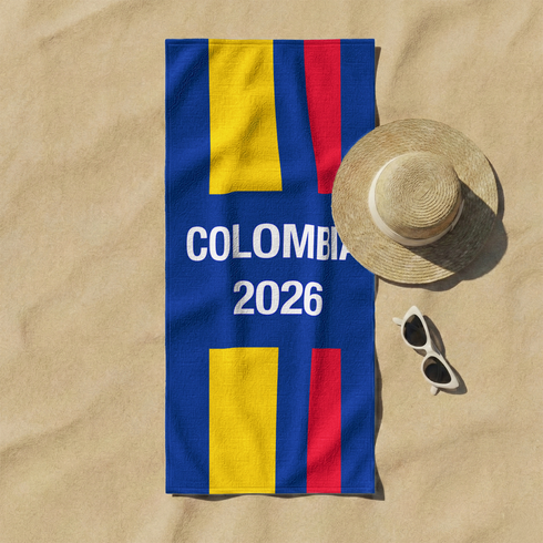 Bandera de Colombia con franjas azul, amarilla y roja sobre fondo azul con texto "COLOMBIA 2026 sutex towel fullview