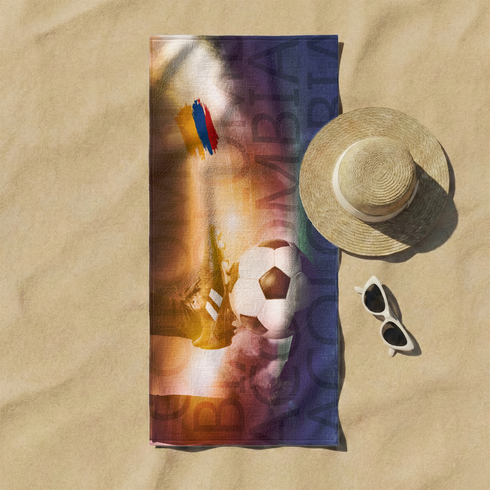 Portero de fútbol saltando hacia balón con resplandor dorado, silueta dramática en tonos azul y naranja sutex towel fullview