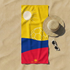 Bandera colombiana estilizada con balón de fútbol amarillo bajo sol radiante sobre franjas azul y roja sutex towel fullview
