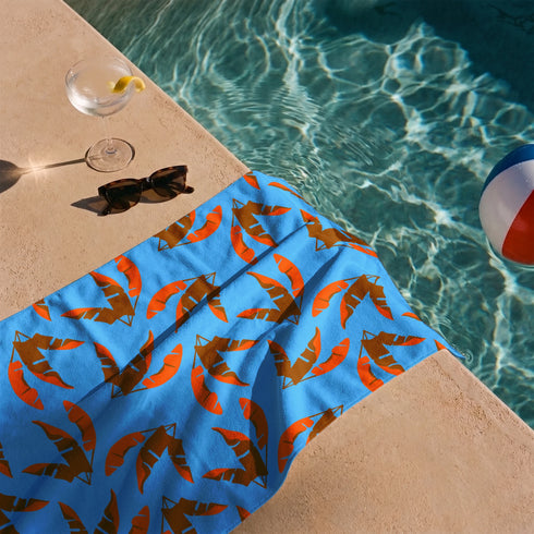 Hojas de Palmera Naranja con Azul Toalla Viajera