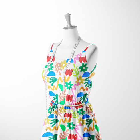 Collage colorido con formas abstractas: flores amarillas, semicírculos azules, líneas onduladas y elementos orgánicos en diversos colores brillantes. sutex woven dress form mockup