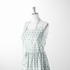Patrón decorativo con rayas verticales y motivos florales de ramas verdes sobre fondo blanco sutex woven dress form mockup