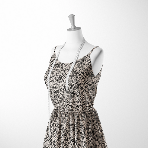 Estampado de pepas negras estilo leopardo sobre fondo beige sutex woven dress form mockup
