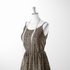 Estampado animal print de leopardo en café y beige sobre fondo negro sutex woven dress form mockup