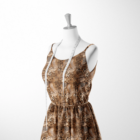 Estampado animal print con leopardo, serpientes y motivos abstractos en tonos café, negro y crema sutex woven dress form mockup