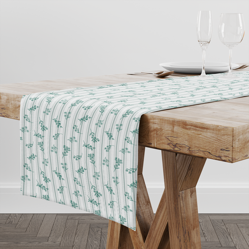 Patrón decorativo con rayas verticales y motivos florales de ramas verdes sobre fondo blanco table runner mockup
