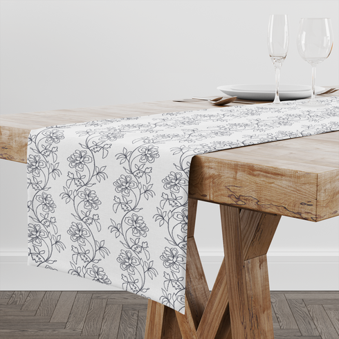 Patrón estampado floral con flores y hojas sobre fondo blanco, diseño botánico delicado table runner mockup