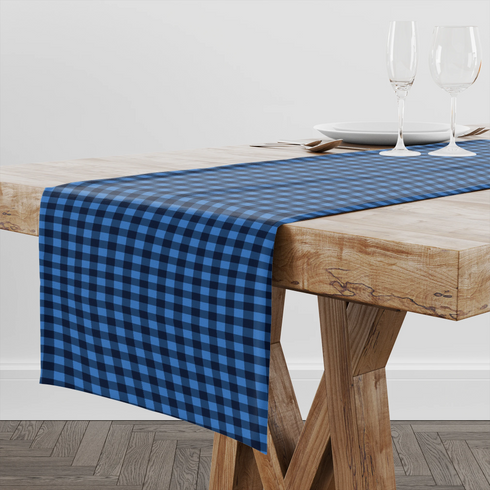 Patrón de cuadros en tonos azules y negro con efecto pixelado geométrico