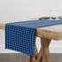 Patrón de cuadros en tonos azules y negro con efecto pixelado geométrico