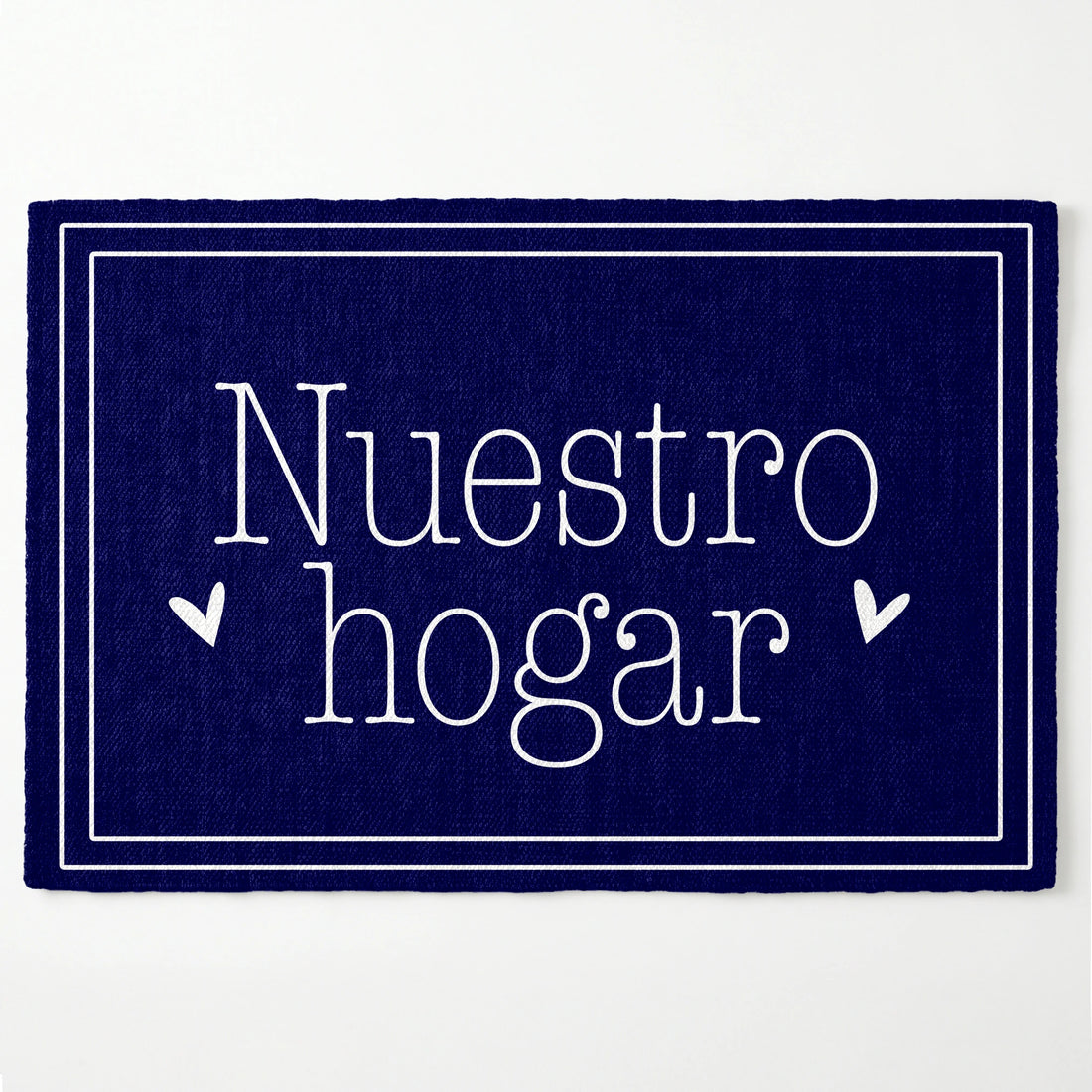 Texto blanco "Nuestro hogar" con flechas decorativas sobre fondo azul marino con marco doble sutex rug 2x3 overhead white